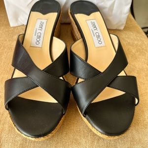 Brand new Jimmy Choo sandals. Never worn and still in the box.
